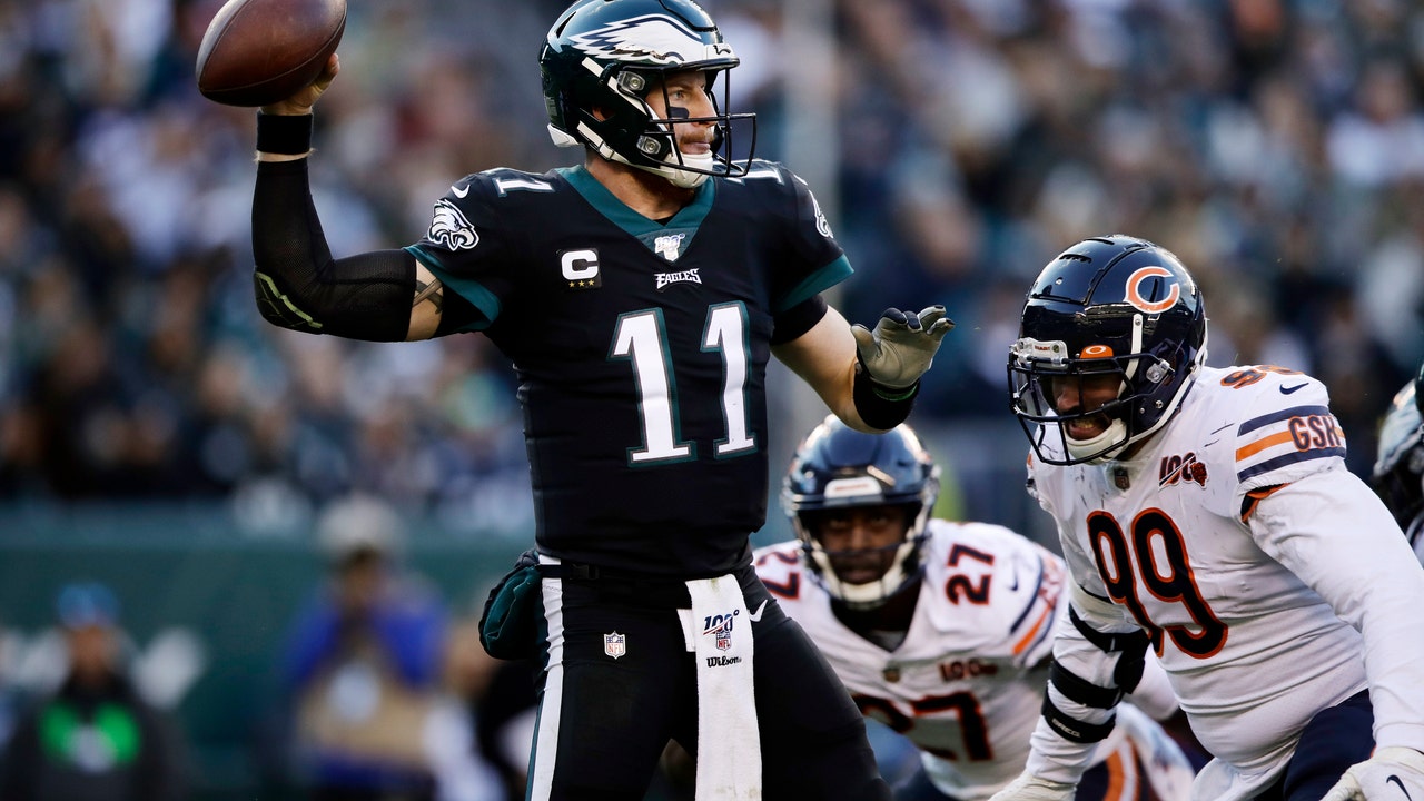 Despite injuries, inconsistency, Eagles in the race at bye
